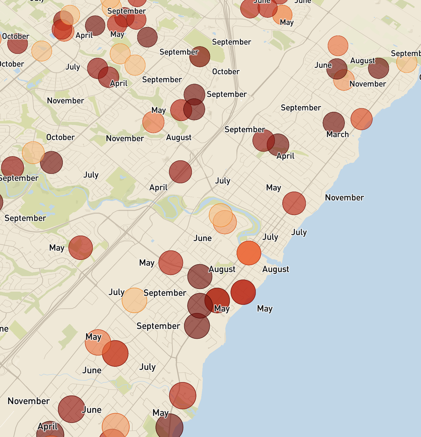 A screenshot of exploring in Mapbox with data driven circles representing house break ins in Oakville in the last 8 months with months labelled.